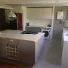 La imagen 3 de la Empresa DISEÑO DE COCINAS - REMODELACIONES - DIMENSIONA SPA Remodelación De Oficinas Y Casas en Las Condes RM